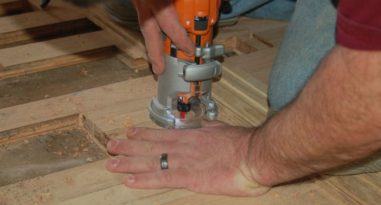 Close-up of a repaired hardwood floor board